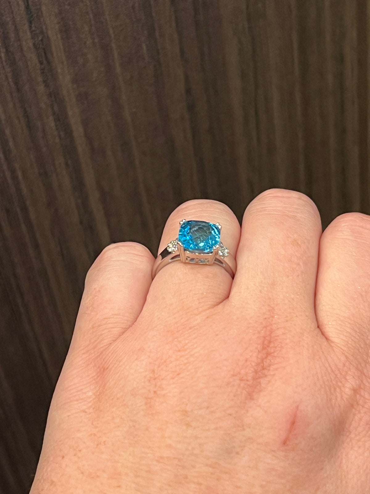 10K White Gold  9mm Blue Topaz and 0.10cttw Diamond Ring - Size 6