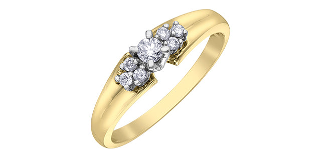 A 10K yellow gold engagement ring with a large central Canadian diamond and smaller surrounding diamonds.