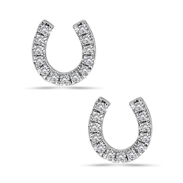 A pair of 14K white gold diamond horseshoe earrings with multiple stones set along the outline of each horseshoe.
