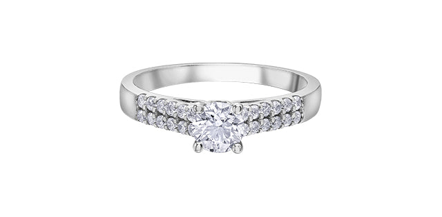 A 14K white gold engagement ring with a central Canadian diamond and smaller diamonds set around it, intended for a size 6.5 finger.