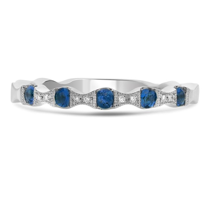 A 14K white gold sapphire and diamond ring with a visible blue sapphire center stone surrounded by smaller white diamonds set in a classic six-prong setting.