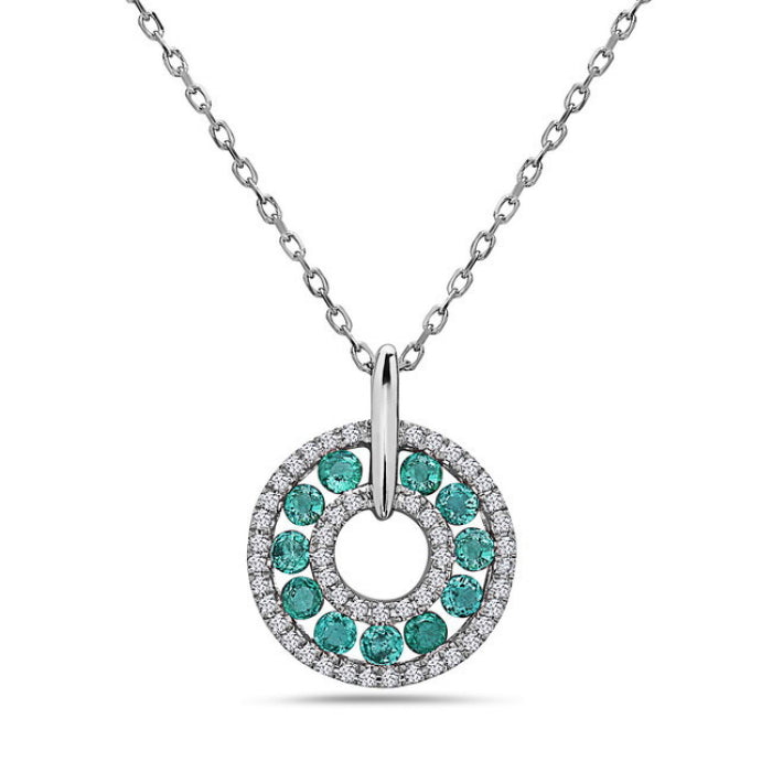 14K white gold emerald and diamond pendant necklace with a round-cut design, featuring multiple emeralds set in a circular pattern with a diamond centerpiece.