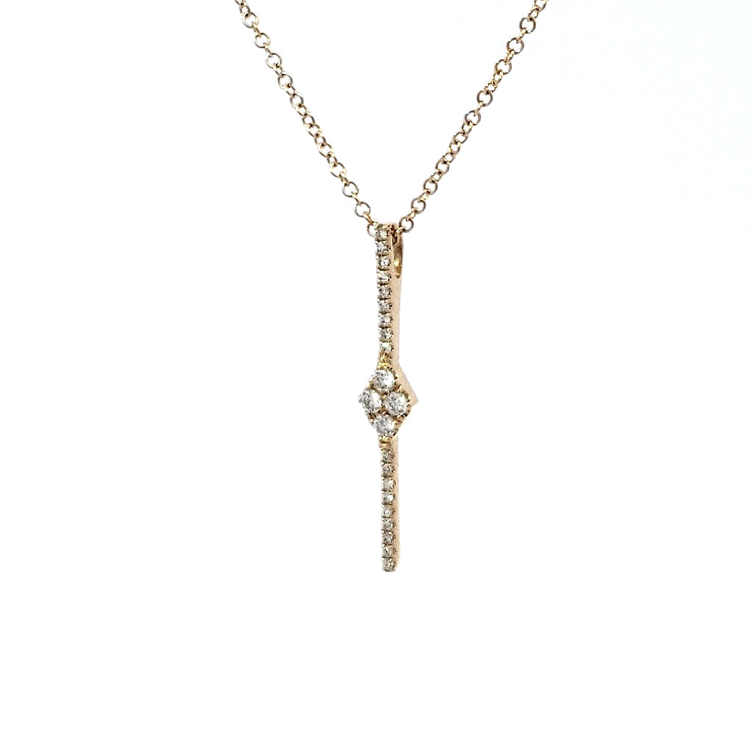 A 14K yellow gold diamond pendant necklace with a clear and visible diamond in a traditional setting.