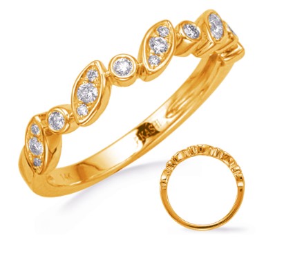 A 14K yellow gold diamond ring with a 0.19 cttw diamond centerpiece, accompanied by a smaller gold band.