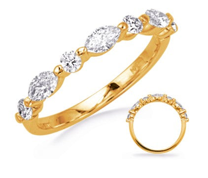 A 14K yellow gold diamond ring with multiple smaller diamonds set around it, and a smaller ring partially visible on the side.