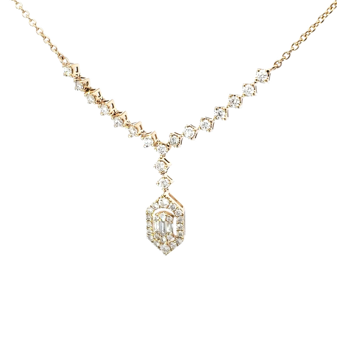 A 14K yellow gold diamond pendant necklace with a clear and visible diamond.