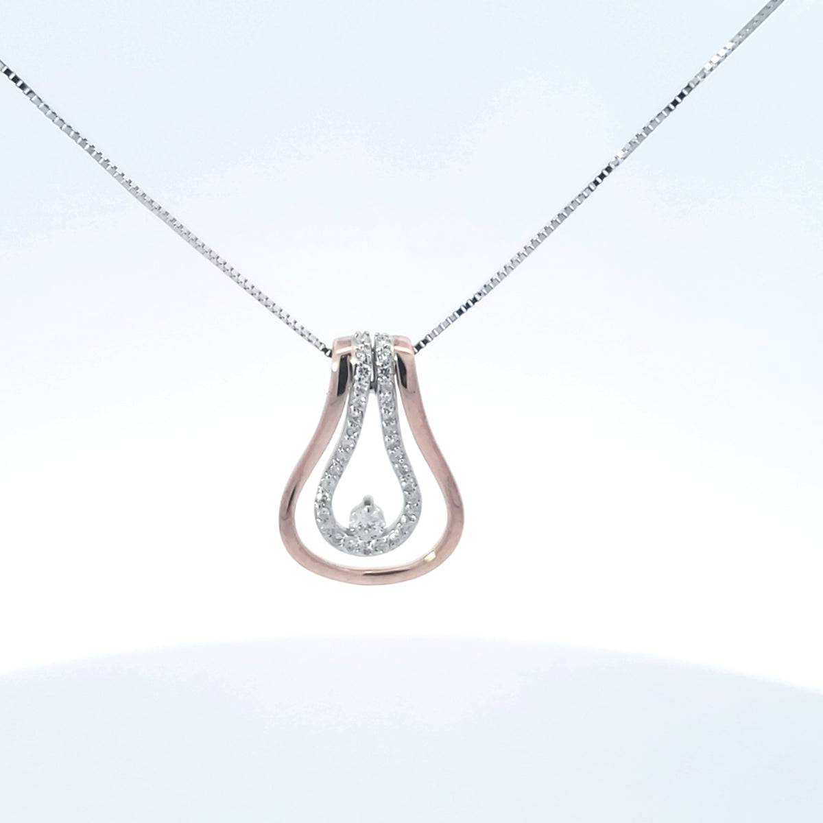 10K Two Tone Rose and White Gold 0.20cttw Diamond Pendant, 18&quot;