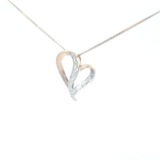 Colgante en forma de corazón con diamantes de 0,06 quilates en oro amarillo de 10 quilates, 18"