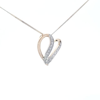 Colgante en forma de corazón con diamantes de 0,06 quilates en oro amarillo de 10 quilates, 18"
