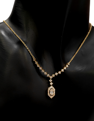Colgante de diamantes de 0,70 quilates en oro amarillo de 14 quilates