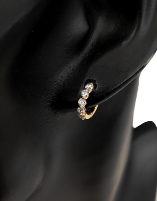 Aretes tipo argolla con diamantes de 0,49 quilates en oro amarillo de 14 quilates