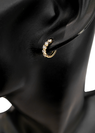 Aretes tipo argolla con diamantes de 0,49 quilates en oro amarillo de 14 quilates