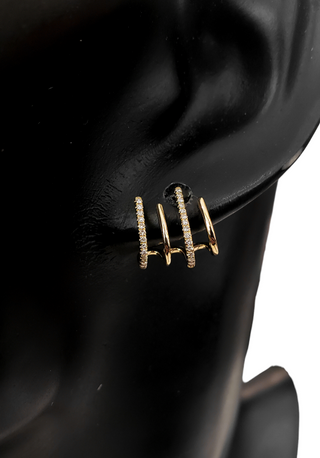 Aretes de diamantes de 0,14 quilates en oro amarillo de 14 quilates