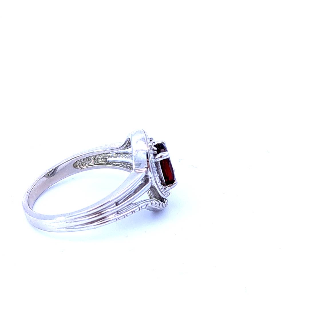 925 Sterling Silver 7 x 5mm Garnet and 0.03cttw Diamond Ring - Size 6