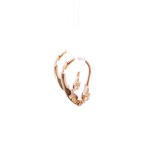 Pendientes de bebé con flor y circonita cúbica en oro amarillo de 10 quilates
