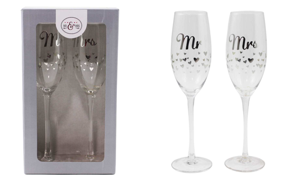 Two champagne flutes labeled 'Mr' and 'Mrs' with a packaging box on a white background.
