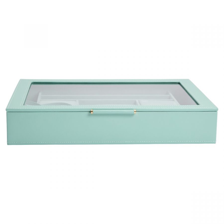 A light green jewelry box with a window, made of leather with a gold-tone clasp.