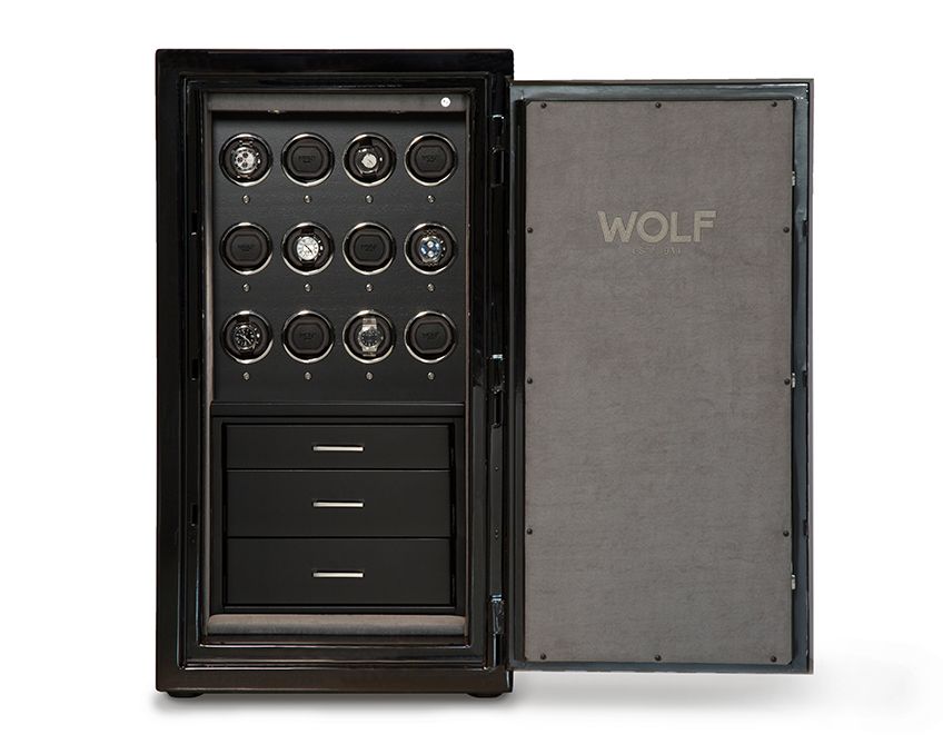An open Atlas 12 Piece Winder Safe by WOLF, displaying the interior with multiple watch winders and storage drawers, finished in black with chrome trim.