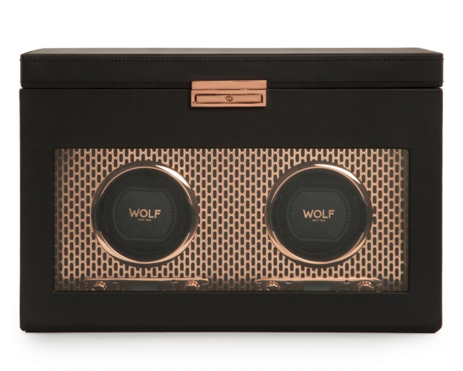 A black double watch winder with copper-plated details and perforated steel design, featuring the branding 'WOLF' on the front.