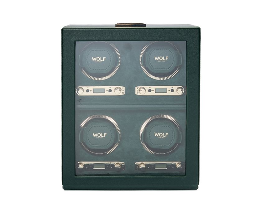 A green 4-piece watch winder with fluted bezel design and a brand logo on the top center.