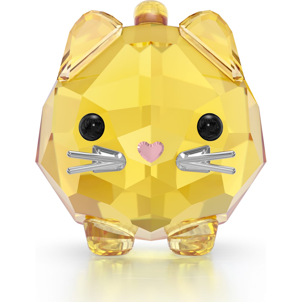 A yellow crystal figurine of a cat with a heart-shaped nose, part of the Swarovski Chubby Cats collection.
