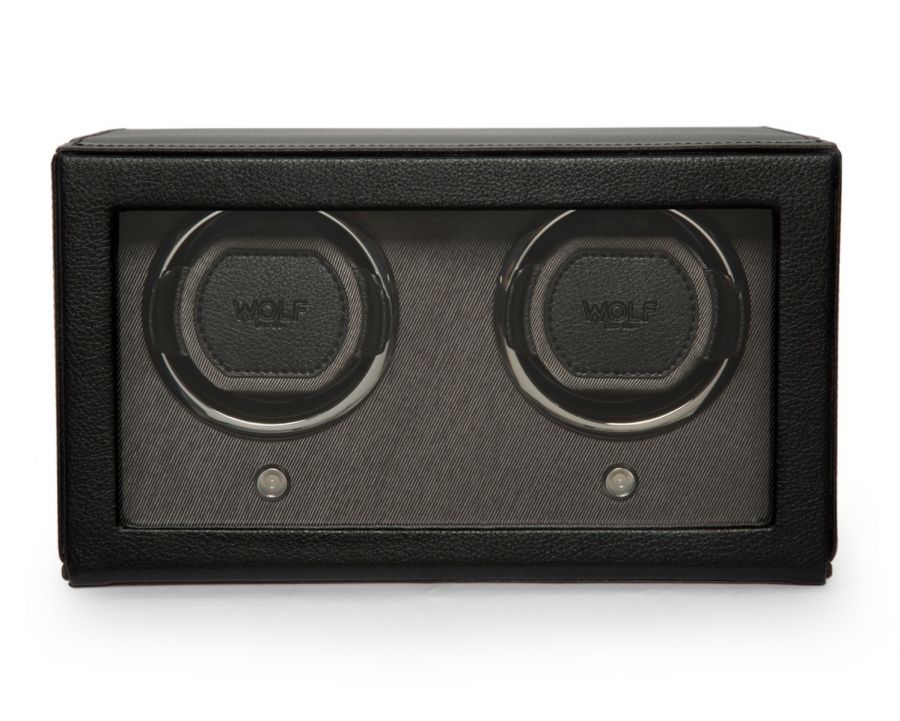 A black leather double watch winder with a cover, featuring two rotating sections for winding watches.