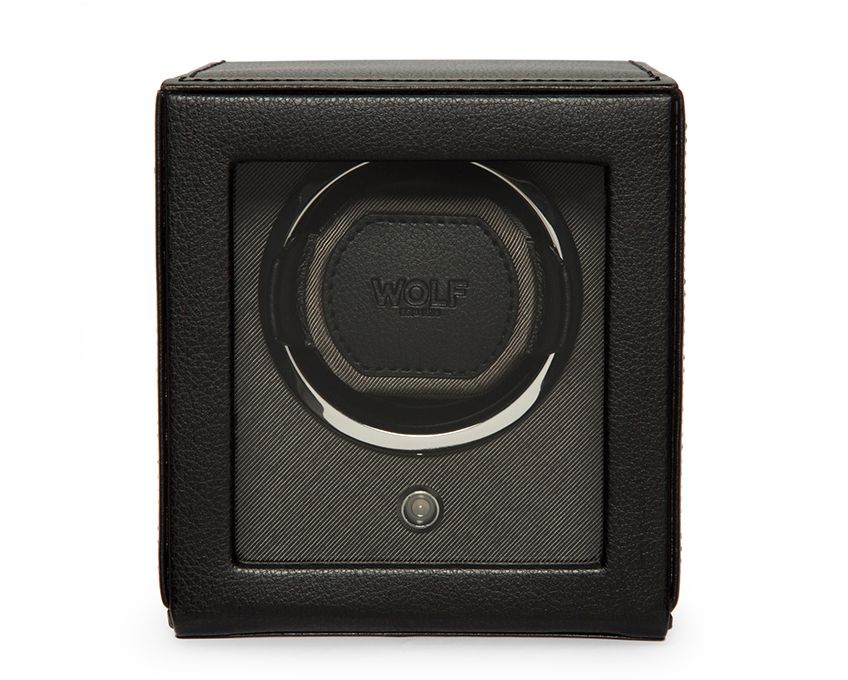 A black WOLF brand single watch winder with a closed cover.