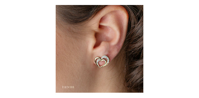 Aretes en forma de corazón con diamantes de 0,12 quilates en oro amarillo de 10 quilates