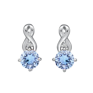 Pendientes de oro blanco de 10 quilates con diamantes y aguamarina