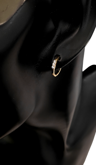 Aretes tipo argolla con diamantes de 0,08 quilates en oro amarillo de 14 quilates