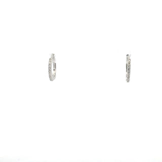 Pendientes tipo argolla/huggie con diamantes de 0,05 quilates en oro blanco de 10 quilates