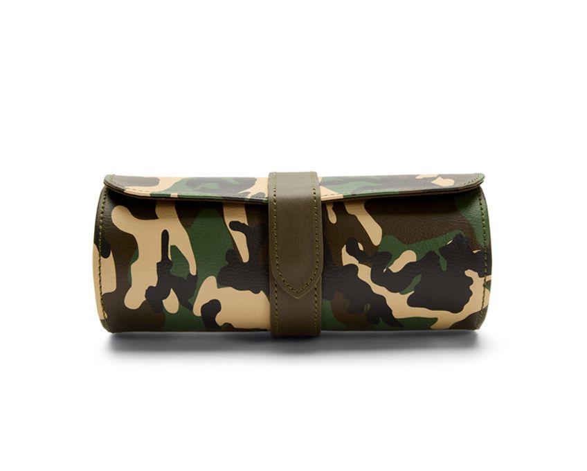 A camouflage-patterned vegan leather watch roll with capsule, designed to hold three watches with two watch guards.