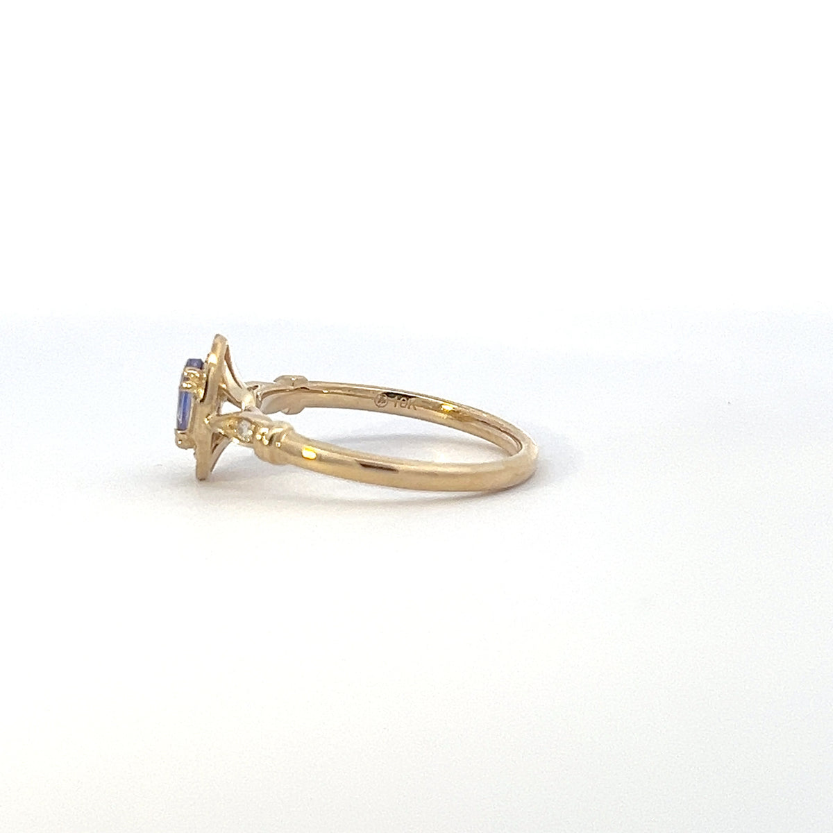 10K Yellow Gold Tanzanite , White sapphire and Diamond Ring
