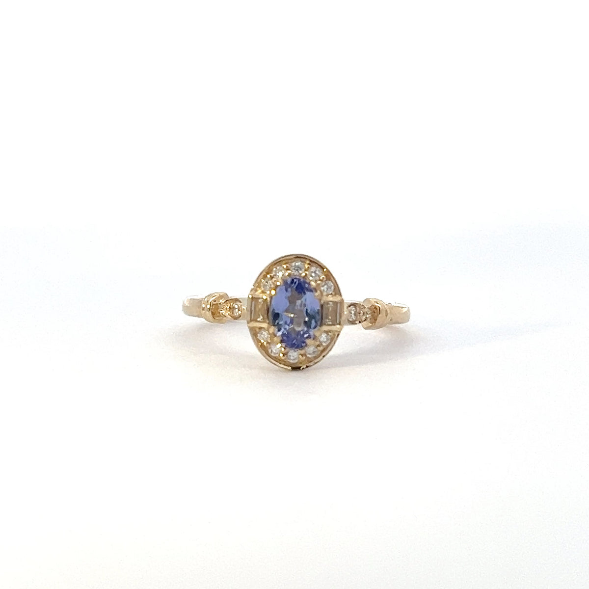 10K Yellow Gold Tanzanite , White sapphire and Diamond Ring