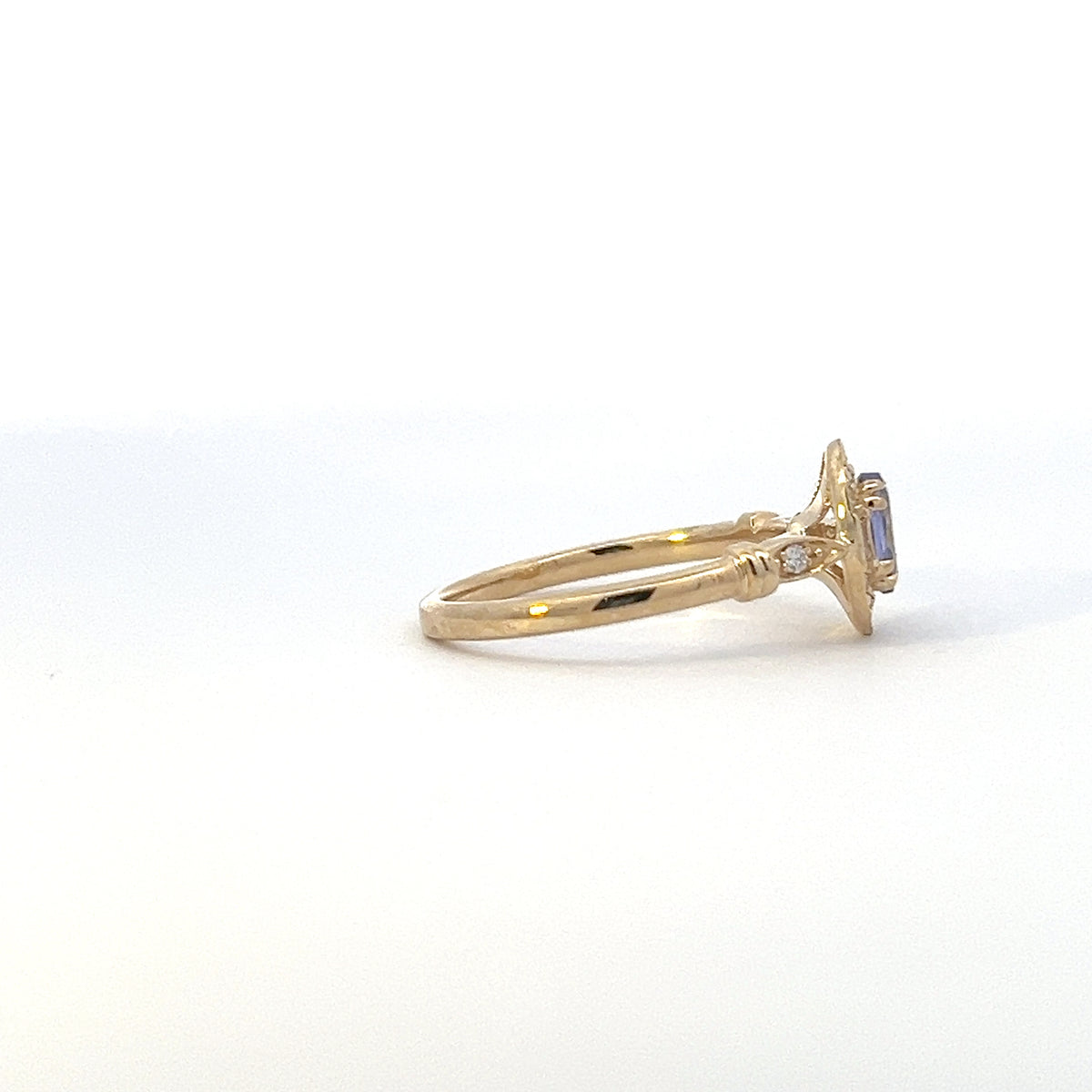10K Yellow Gold Tanzanite , White sapphire and Diamond Ring
