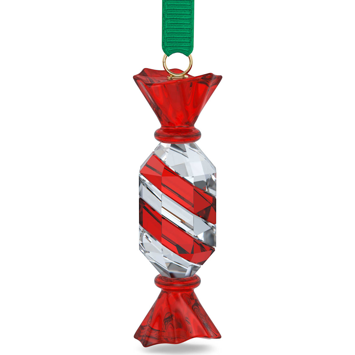 A Swarovski crystal holiday ornament in the shape of a candy with red and white stripes, suspended by a green ribbon, with a gold-tone hanger.