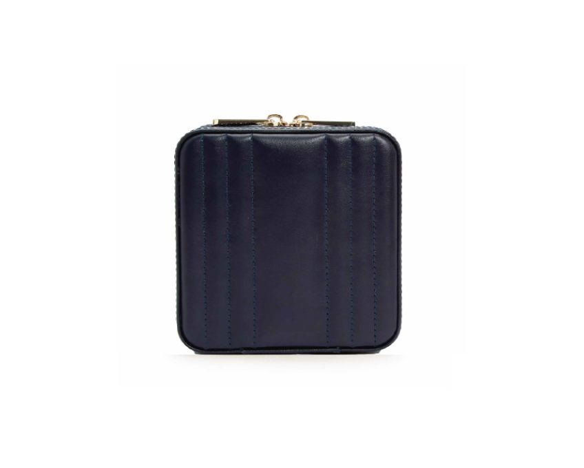 A navy-colored jewelry case with a zipper closure and gold hardware.