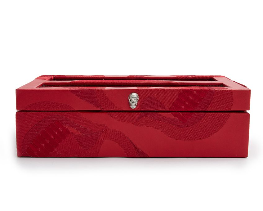 A red vegan leather watch box with skull embroidery and a glass cover, featuring brushed chrome skull hardware.