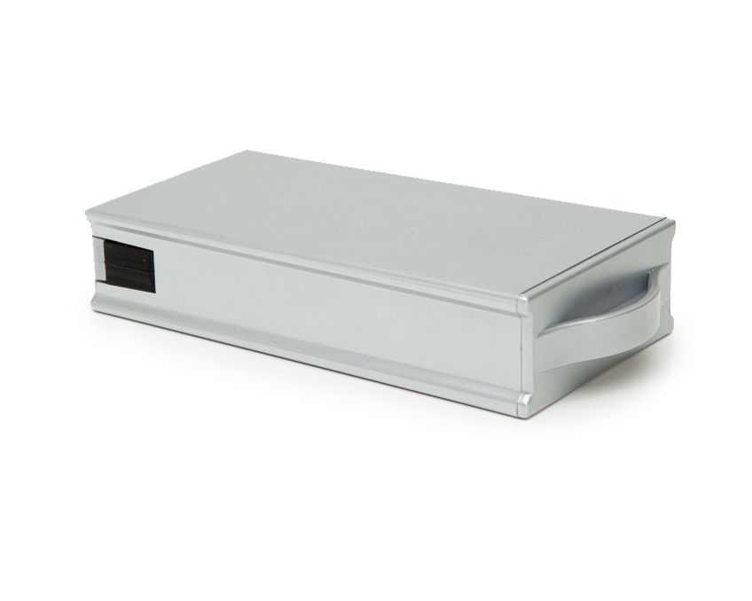 A silver molded plastic connecting joint for watch winder modules.