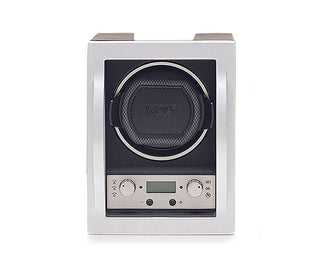 A WOLF brand watch winder with a digital display and control knobs, primarily in black and silver colors.