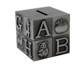 Metallic block-shaped money box with letters and symbols on a white background