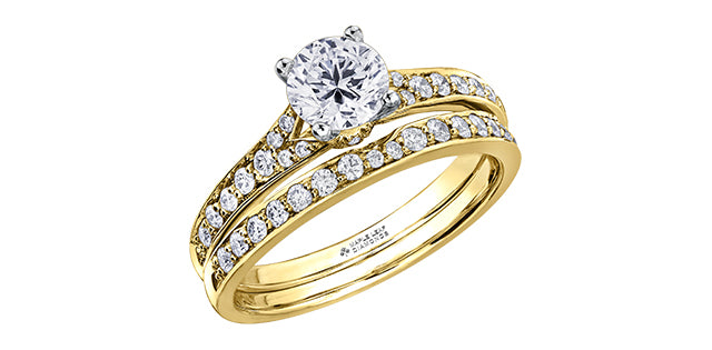 Anillo de compromiso de diamantes canadienses de talla brillante redonda de 0,50 quilates en oro amarillo de 18 quilates