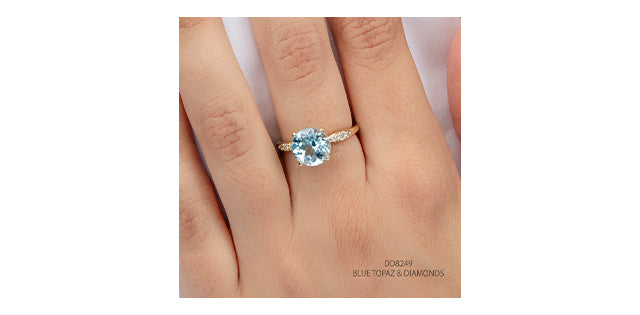 10K Yellow Gold 9mm Cushion Cut Sky Blue Topaz and 0.12cttw Diamond Ring