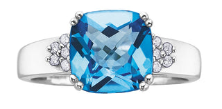 Anillo de oro blanco de 10 quilates con topacio azul de 9 mm y diamantes de 0,10 quilates - Talla 6