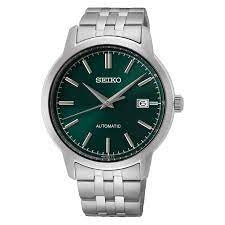 A SEIKO men's watch with a stainless steel band and a green dial, showcasing a rotating bezel and a three-fold clasp.