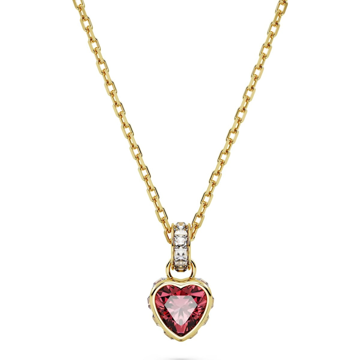 A gold-tone plated Swarovski Chroma pendant in the shape of a heart with a red centerstone, surrounded by square clear crystals. The pendant is attached to a gold-tone plated chain.