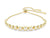 A gold-tone plated Swarovski Imber bracelet featuring a series of round-cut crystals, with a sliding closure.