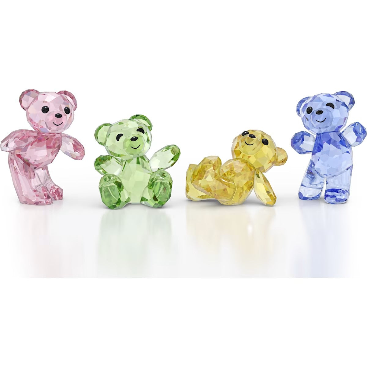 Four colorful crystal bear figurines on a white background