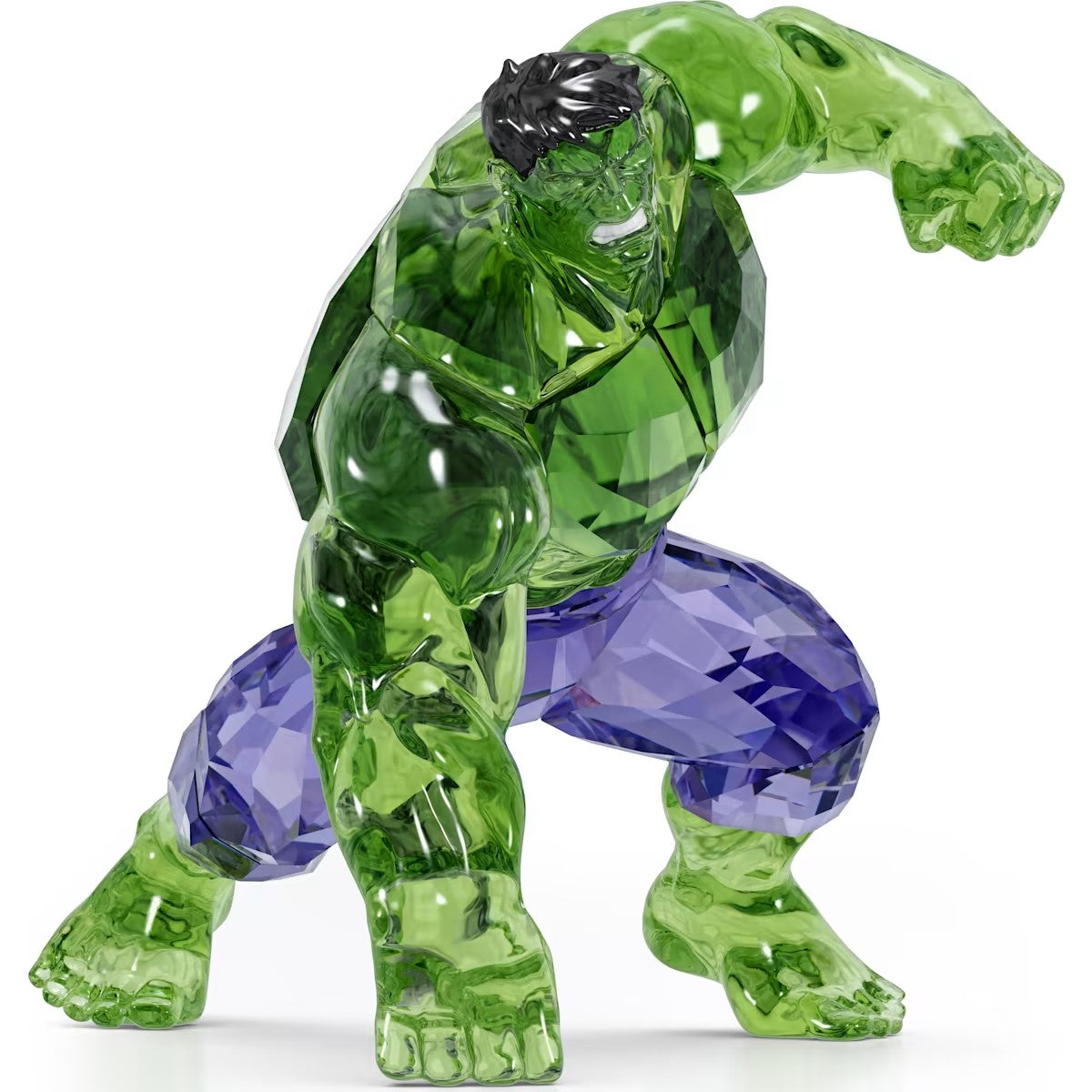 A Swarovski crystal figurine of the Hulk in a dynamic action pose with a green and purple color scheme.