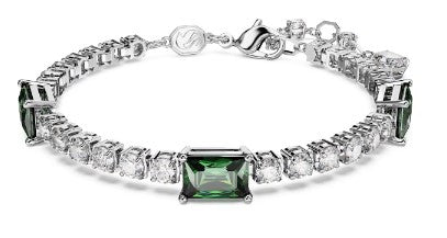 A rhodium-plated Swarovski Matrix Tennis bracelet featuring mixed cuts of green gemstones.